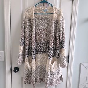 Womens size s/m cardigan. Bought from local boutique. Never worn!